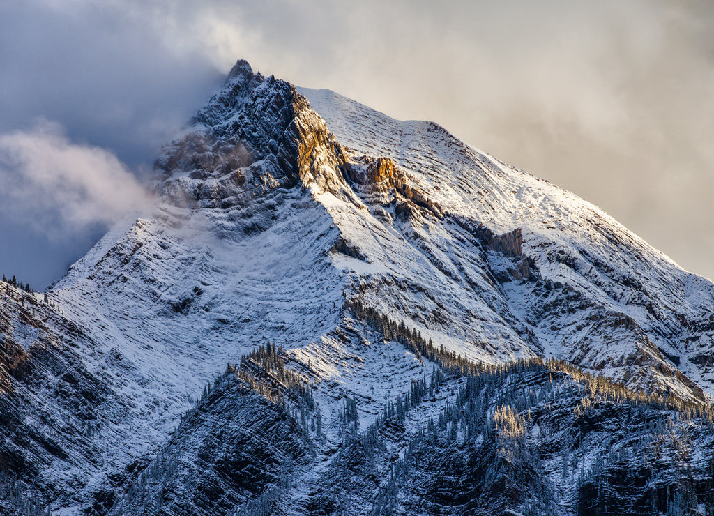 Fresh snow on a mountain peak in the Canadian Rockies, British Columbia, Canada