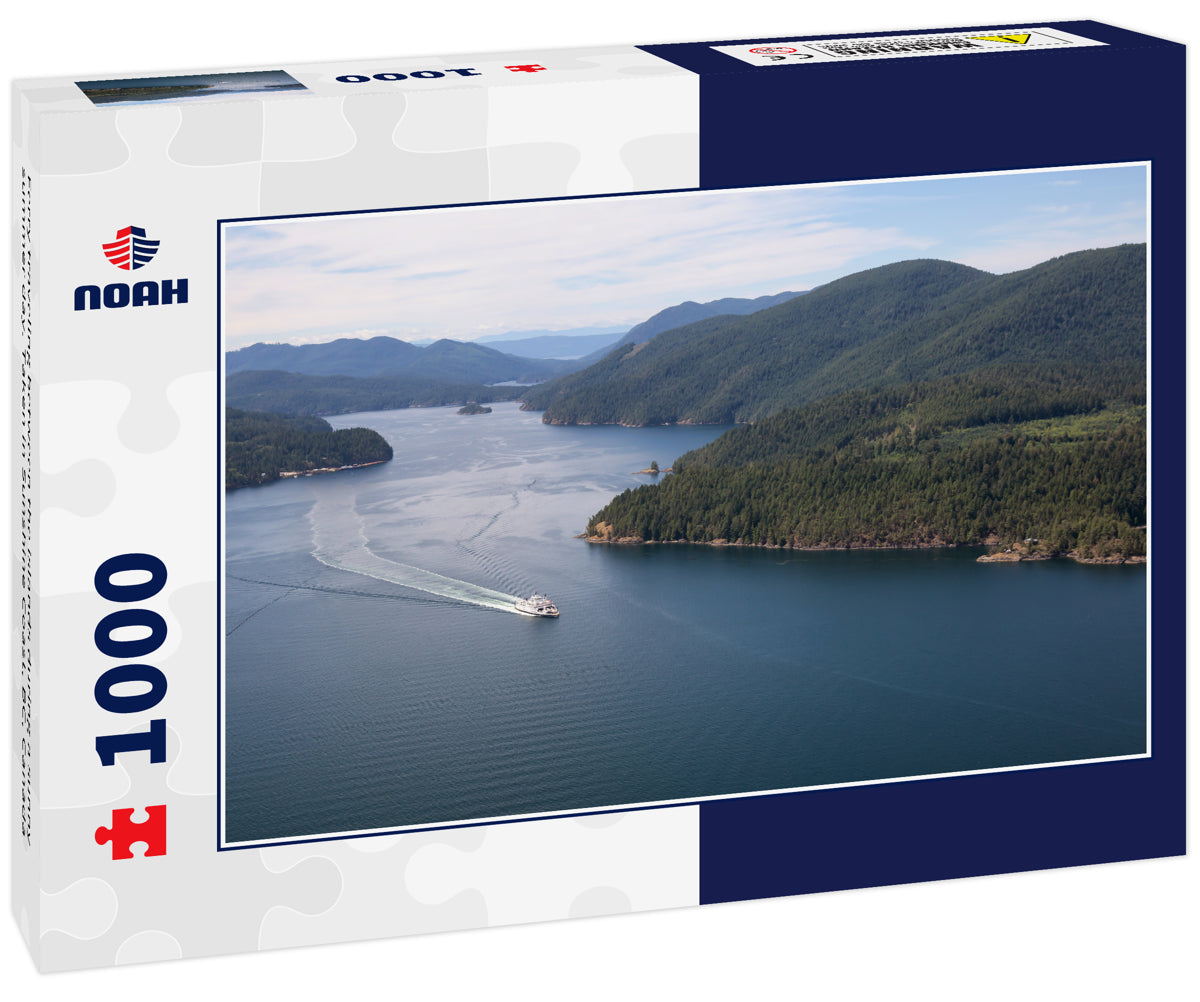 Ferry traveling between the islands during a sunny summer day. Taken in Sunshine Coast, BC, Canada