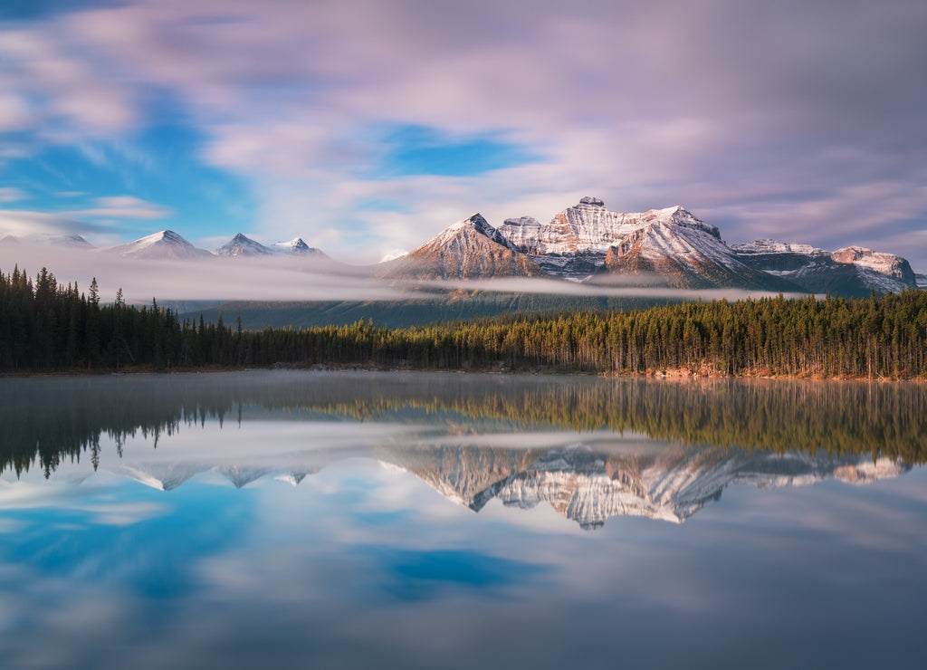 Lake Herbert panorama in a foggy morning with glaciers mountain and reflection in Banff National Park, Canada The Canadian Rockies or Canadian Rocky Mountains