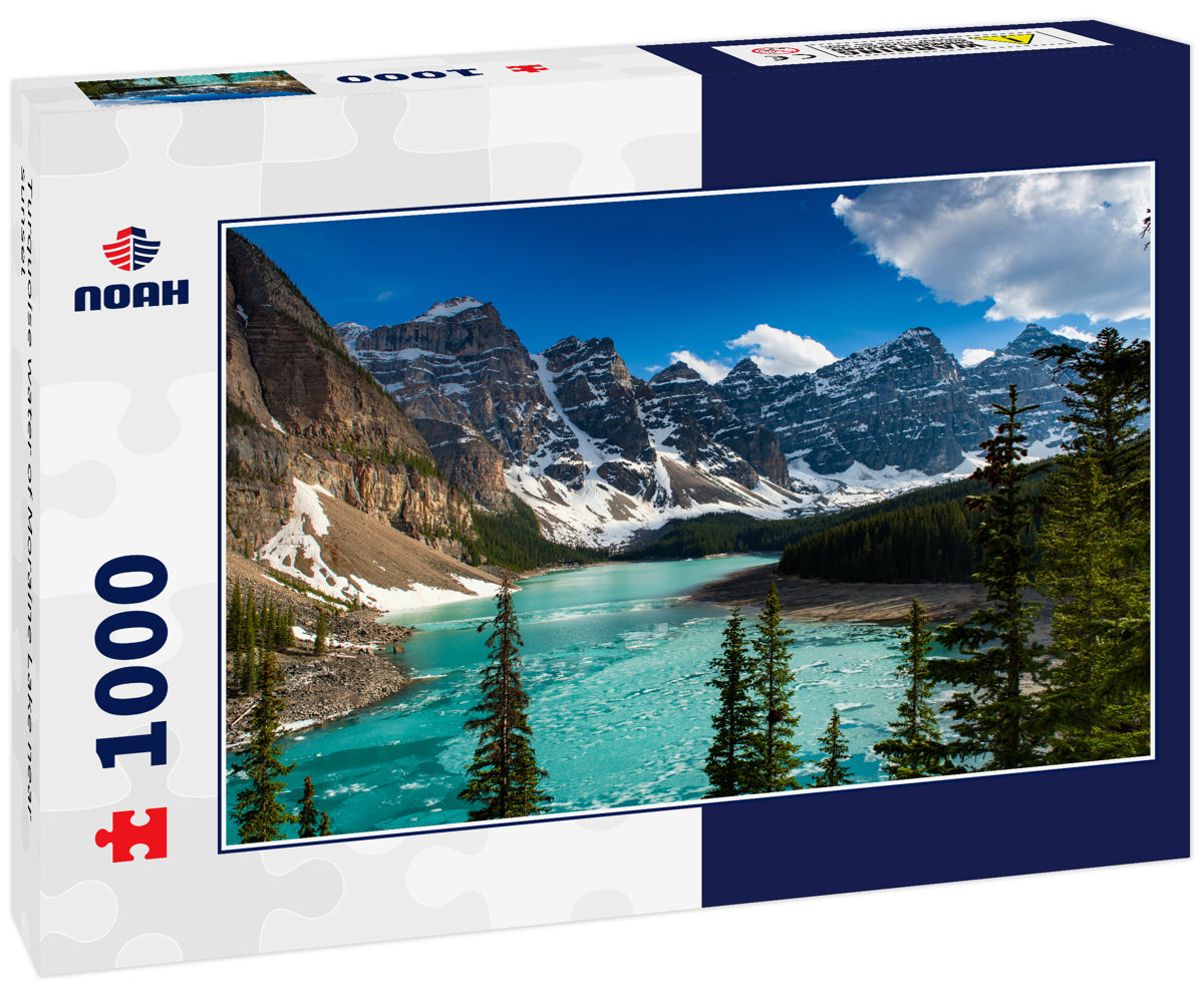 Turquoise water of Moraine Lake near sunset