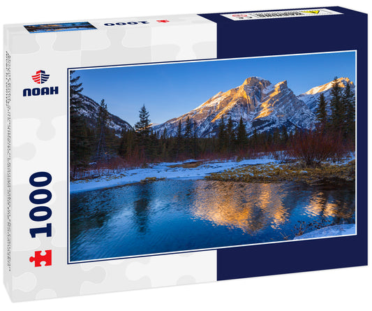 Mount Kidd, a mountain in Kananaskis in the Canadian Rocky Mountains, Alberta, Canada and the Kananaskis River in winter