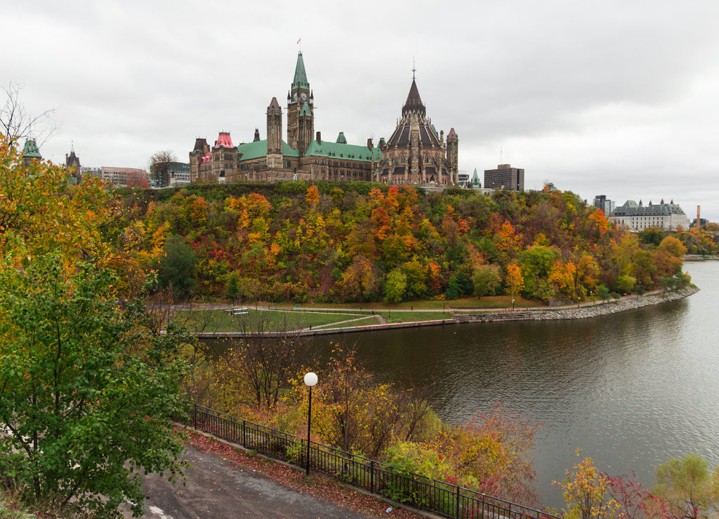Parliament hill (Ottawa, Ontario, Canada). Beautifil wide-angle shot during the fall season. Crown land on the southern banks of the Ottawa River