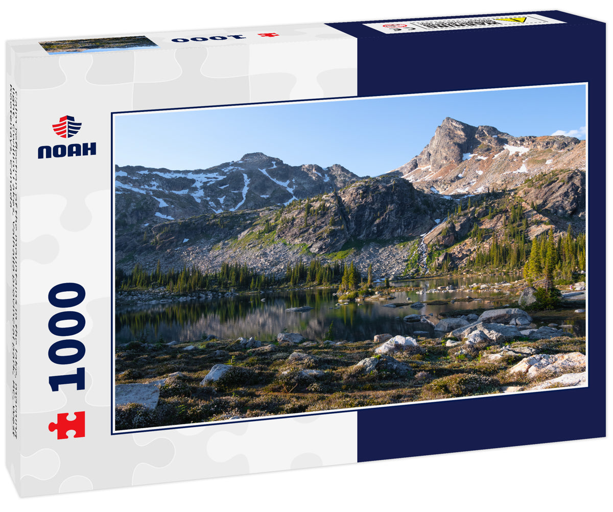 Calm reflection of the mountains in the lake, morning light. Gwillim Lakes, Valhalla provincial park, BC, West Kootenays, Canada