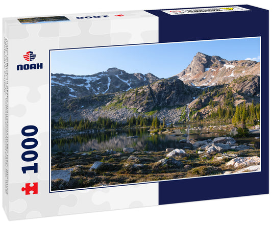 Calm reflection of the mountains in the lake, morning light. Gwillim Lakes, Valhalla provincial park, BC, West Kootenays, Canada