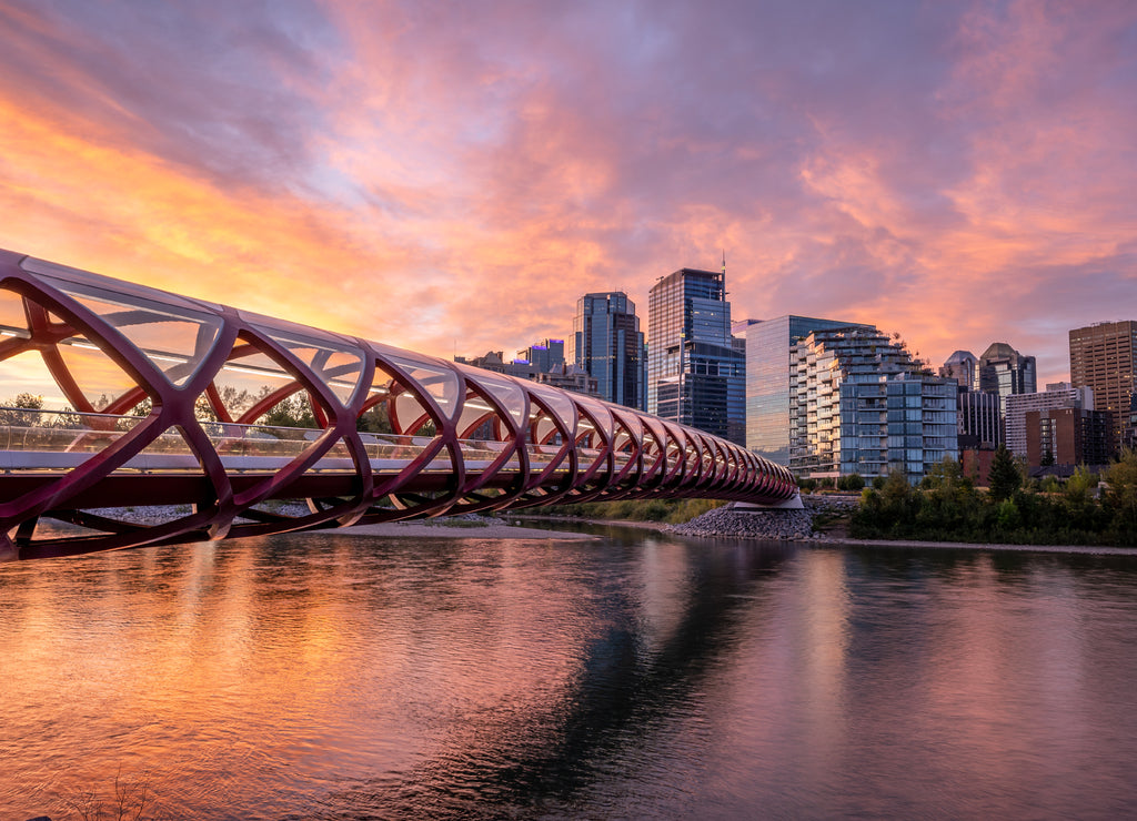 View of pedestrian bridge over the Bow River in Calgary Alberta at sunrise