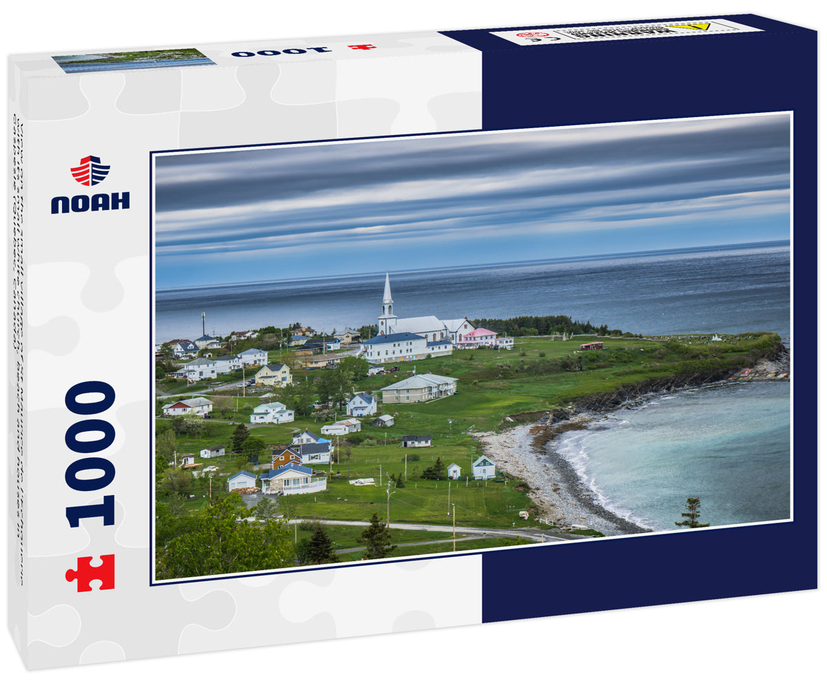 View on the small village of St Maurice de l'Echouerie with its small white church, beach and houses in Gaspesie (Quebec, Canada)