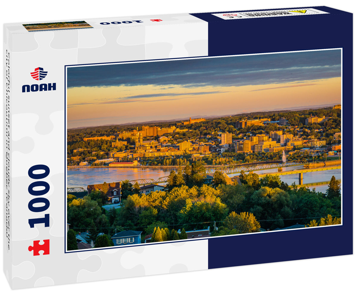 Colorful sunset and cloudy sky over the city of Chicoutimi in Quebec (Canada)