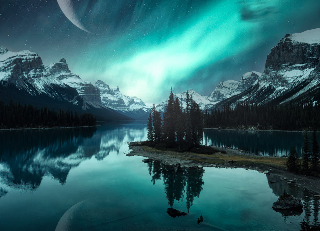 Landscape of Spirit Island with Aurora Borealis over Canadian Rockies and crescent moon on Maligne lake at Jasper national park