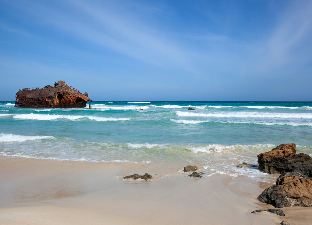 Sand dunes landscape with the Atlantic Ocean in the background near Cabo Santa Marina on Boa Vista in Cape Verde