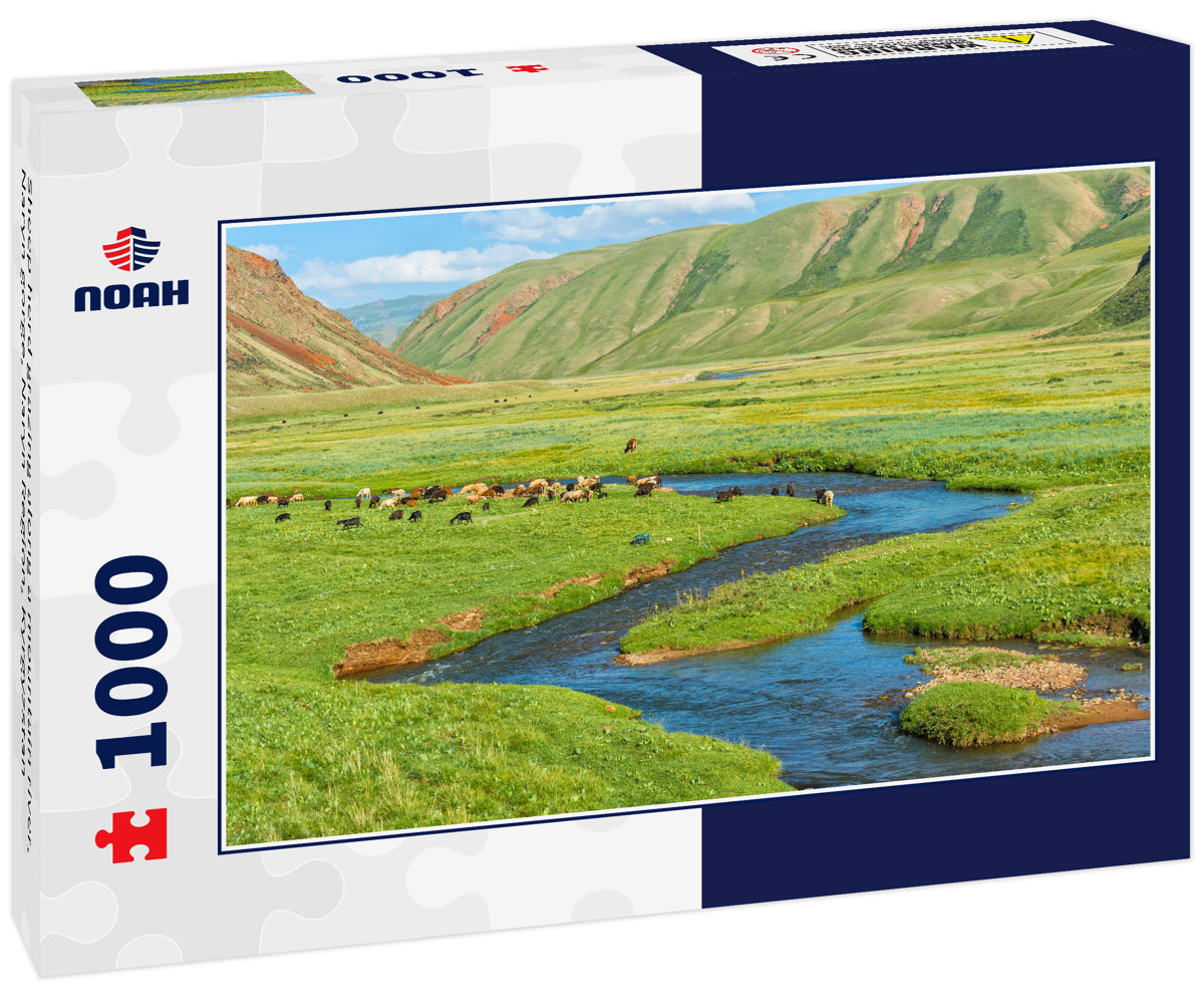 Sheep herd grazing along a mountain river, Naryn gorge, Naryn Region, Kyrgyzstan