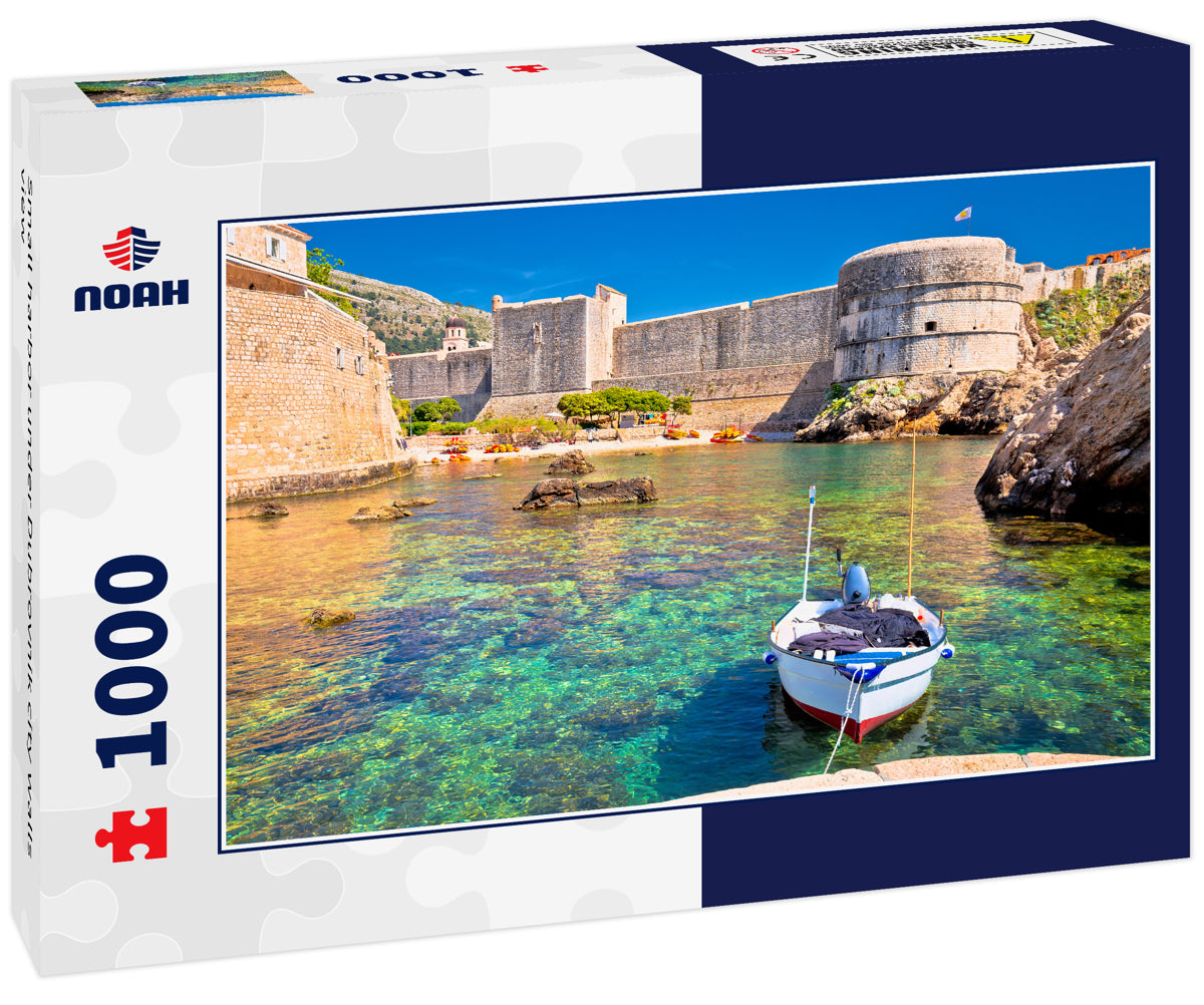 Small harbor under Dubrovnik city walls view