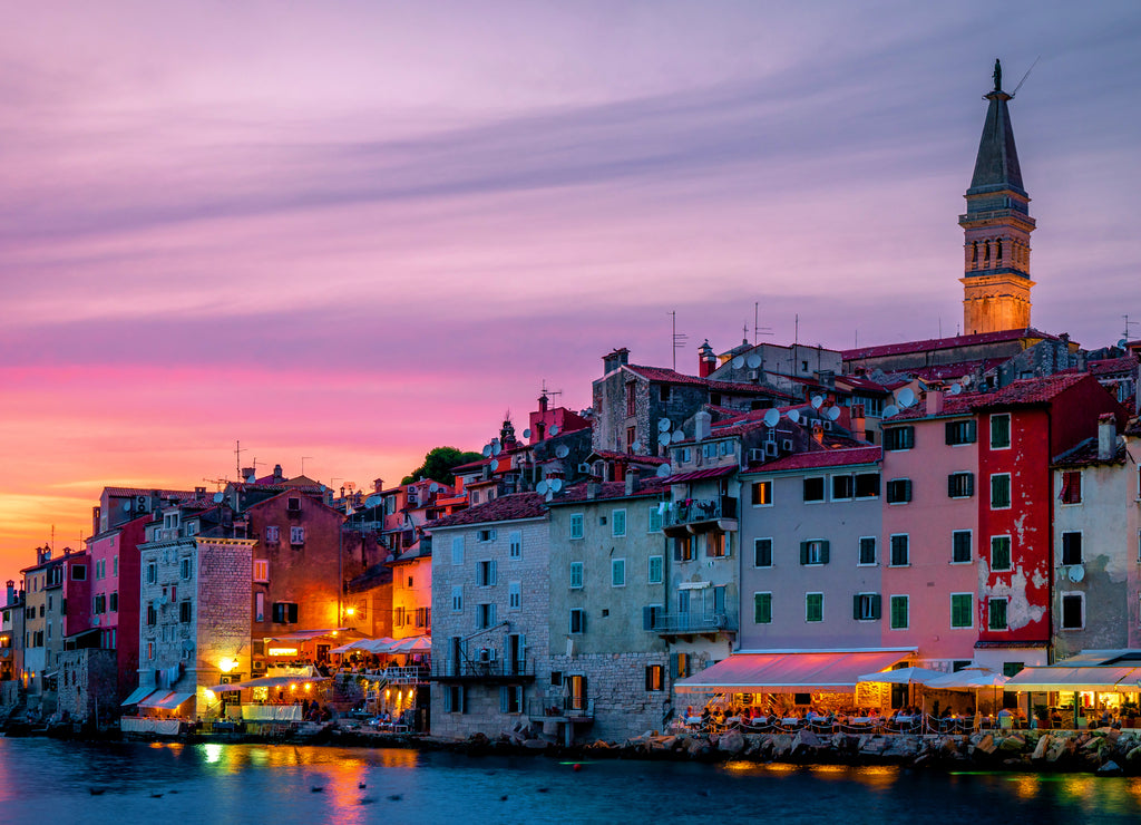 Rovinj colorful town Croatia, sunset Rovinj historical town with church and ocean