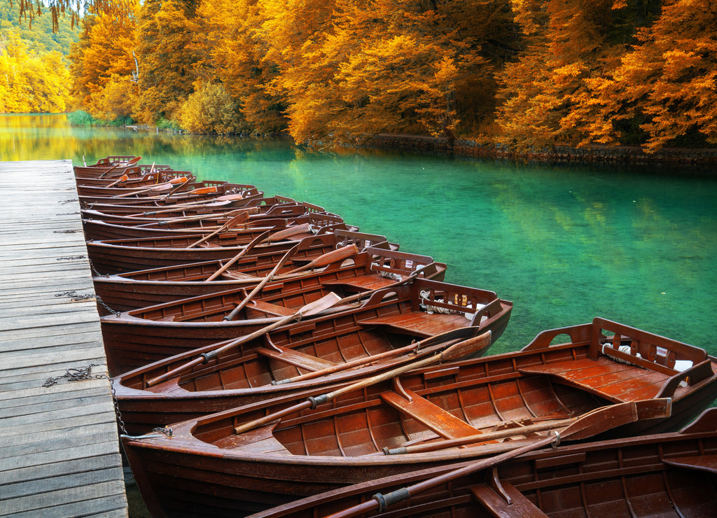 Boats parking at pier with turquoise lake landscape of Plitvice Lakes National Park, UNESCO heritage