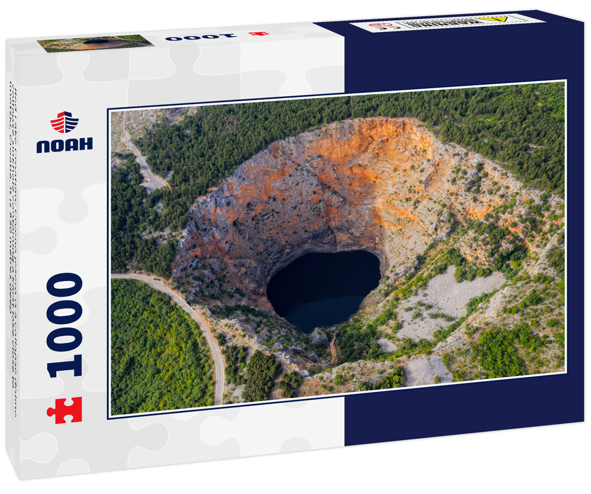 Red Lake Croatian: Crveno jezero is a collapse doline collapse sinkhole containing a karst lake close to Imotski, Croatia. It is 530 metres deep