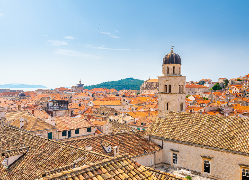 Aerial panoramic view of old city Dubrovnik. Ancient city with big city walls near adriatic sea. View of roofs, sunny summer day