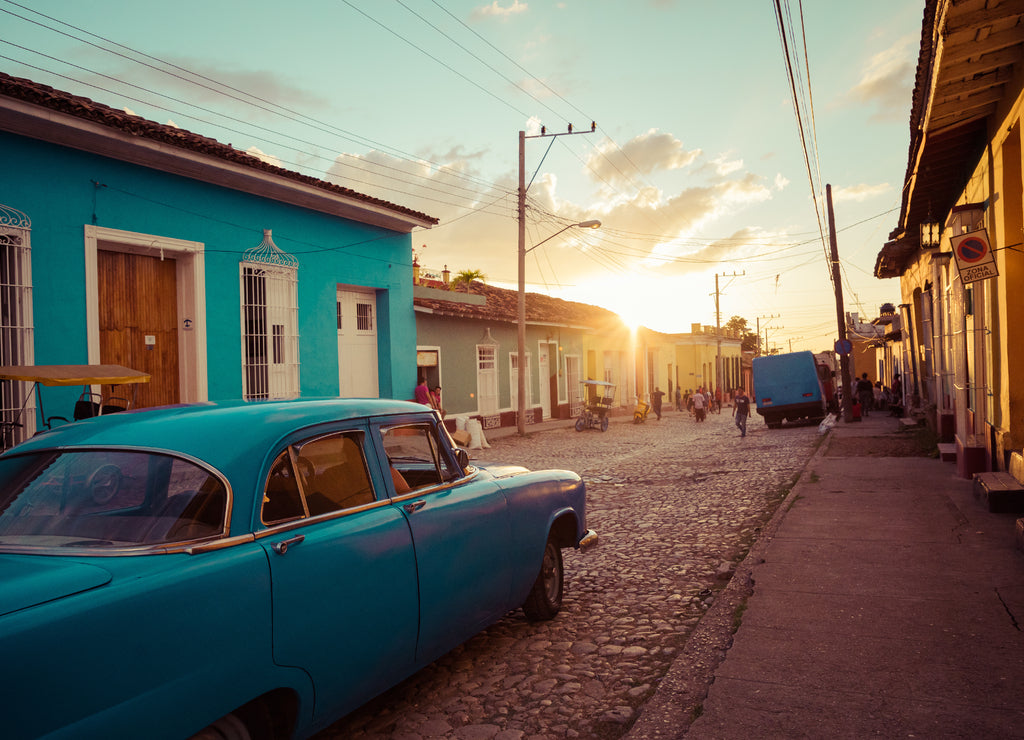 Colorful houses and vintage cars in Trinidad, Cuba. Unesco World Heritage Site