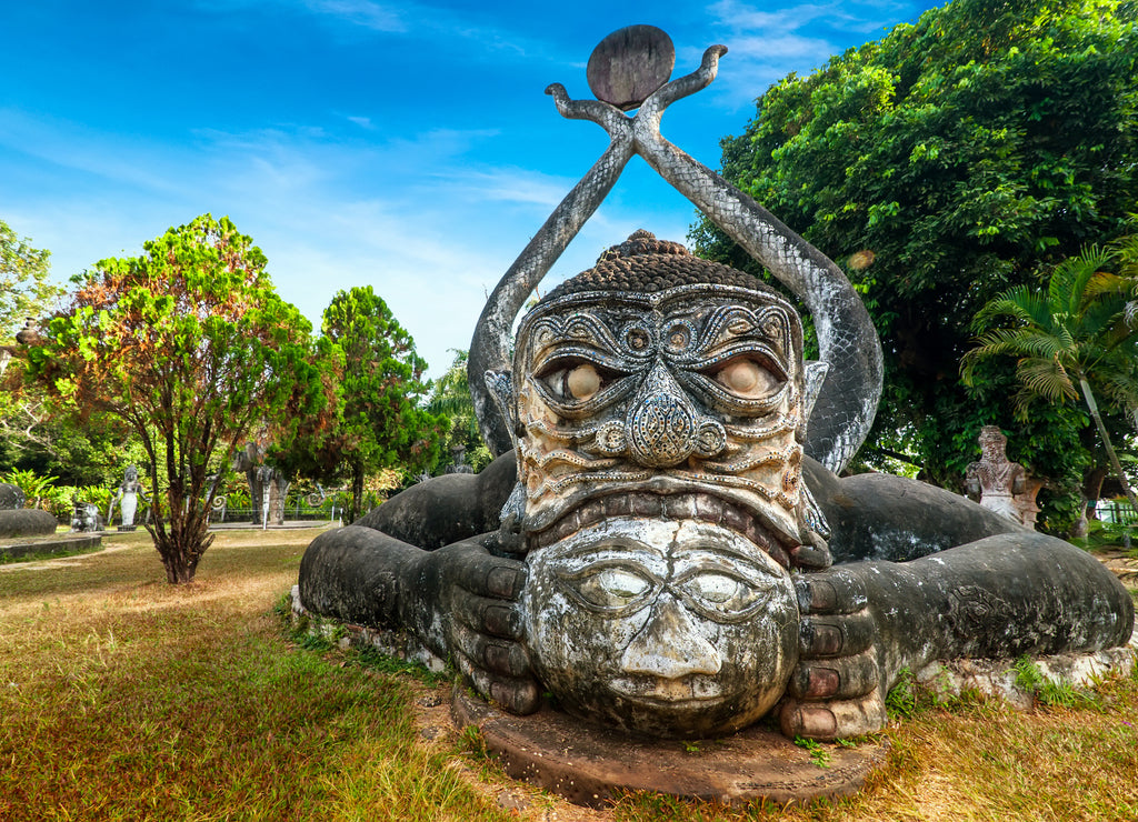 Amazing view of mythology and religious statues at Wat Xieng Khuan Buddha park. Vientiane, Laos
