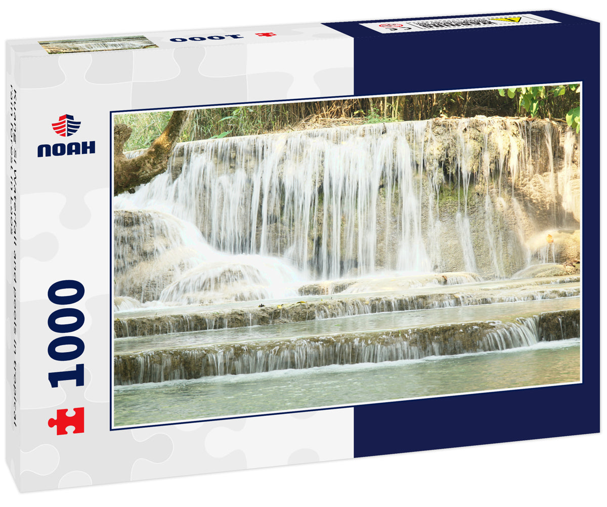 Kuang Si Waterfall and pools in tropical rain forest in Laos