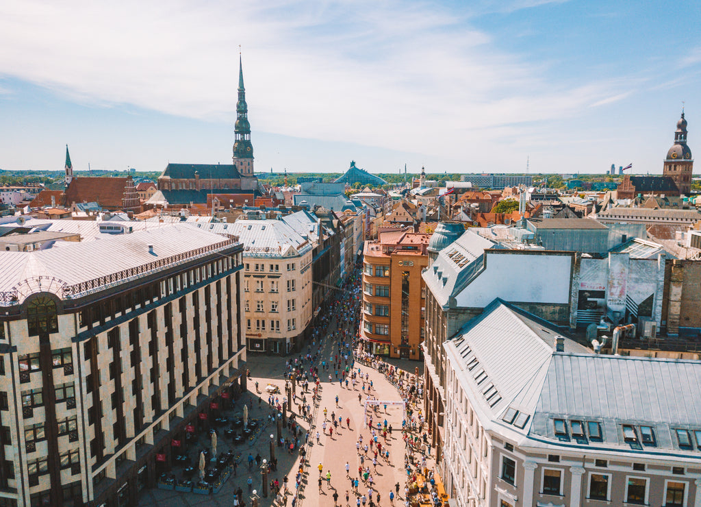 Aerial winter view of the Riga old town from above with a view of river, national library and Dome Cathedral