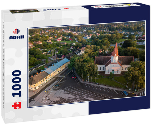 Aerial view of empty parking lot in city center in front of the church, Smiltene, Latvia