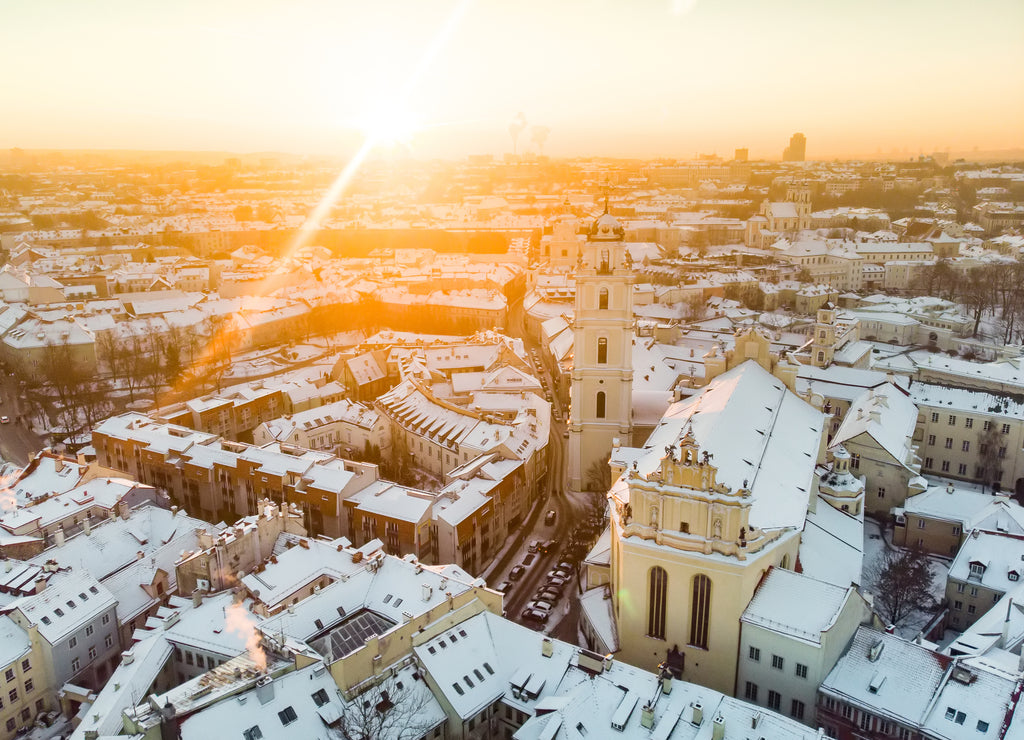 Beautiful Vilnius city panorama in winter with snow covered houses, churches and streets. Winter city scenery in Vilnius, Lithuania