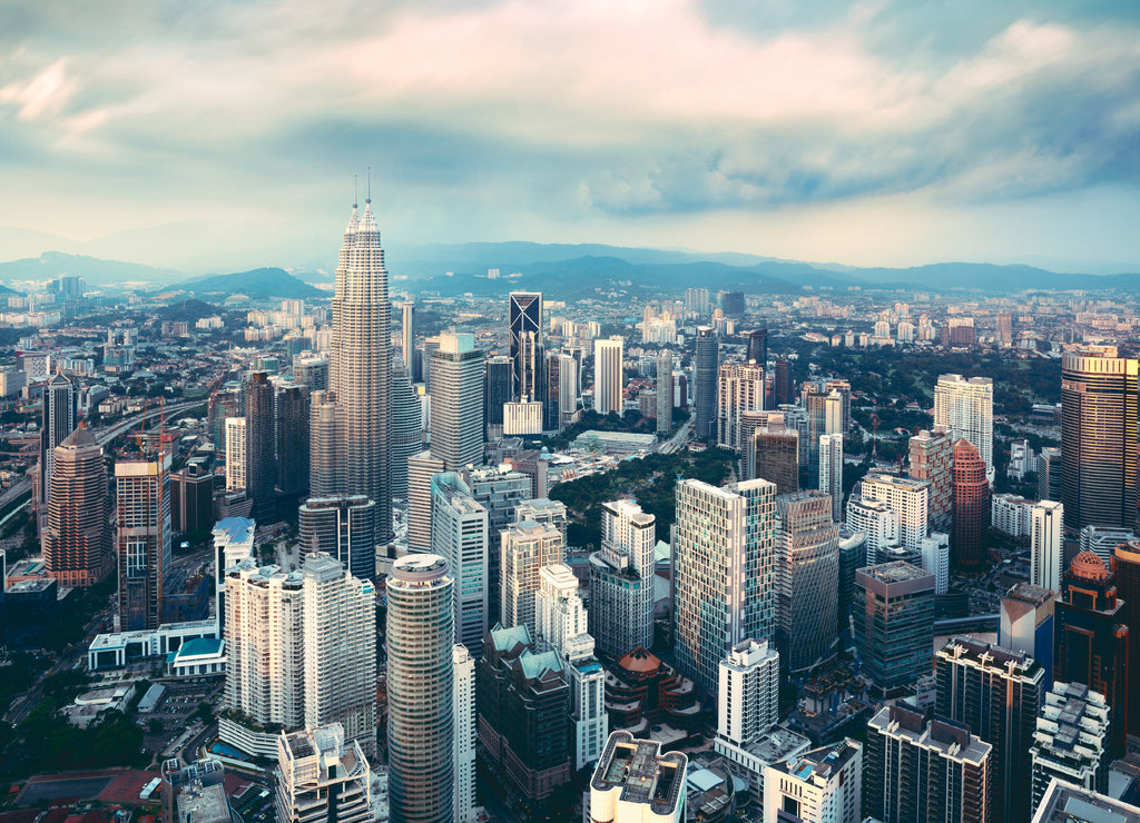 Kuala lumpur city skyline in evening, Kuala lumpur is capital city of malaysia, Business district area in Kuala lumpur, Malaysia Vintage color tone
