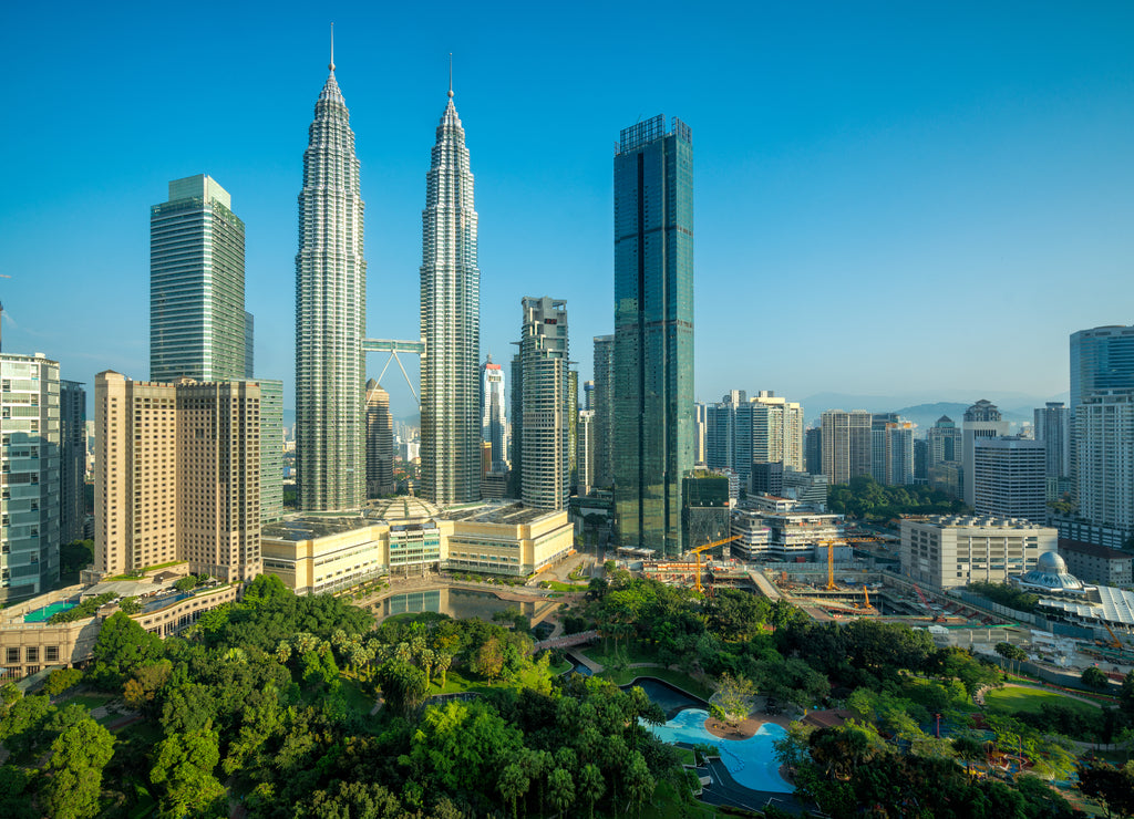 Cityscape of Kuala Lumpur Panorama at sunrise. Panoramic image of skyscraper at Kuala Lumpur, Malaysia skyline with blue sky