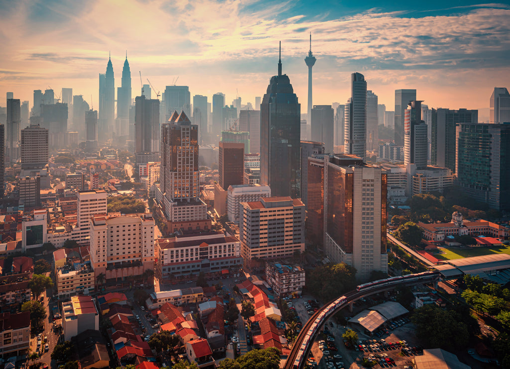 Aerial view of Kuala Lumpur city skyline at sunset in Kuala Lumpur, Malaysia