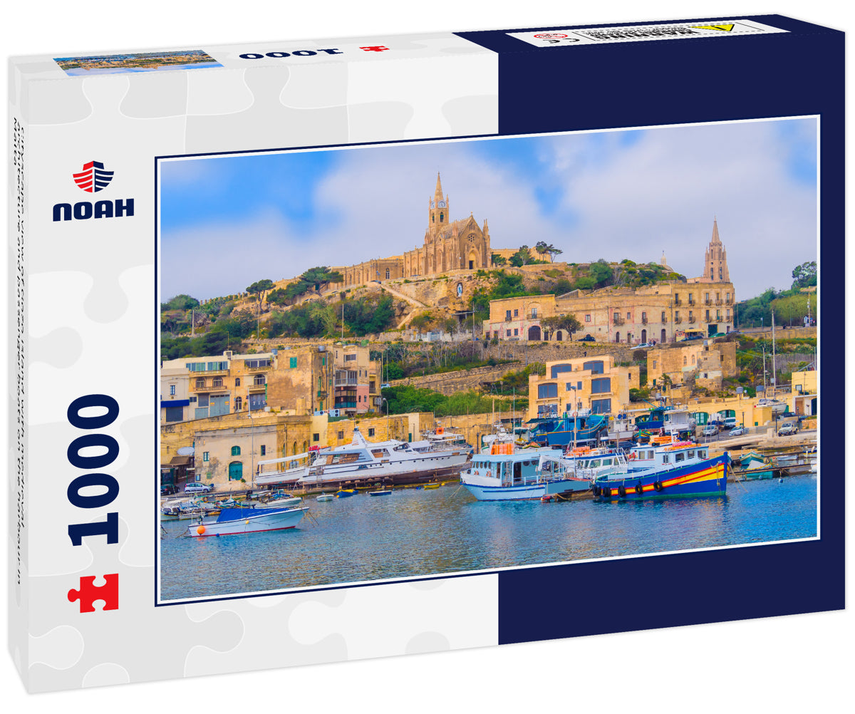 Cityscape view of Gozo island with medieval architecture and passenger boats on the harbour in Malta