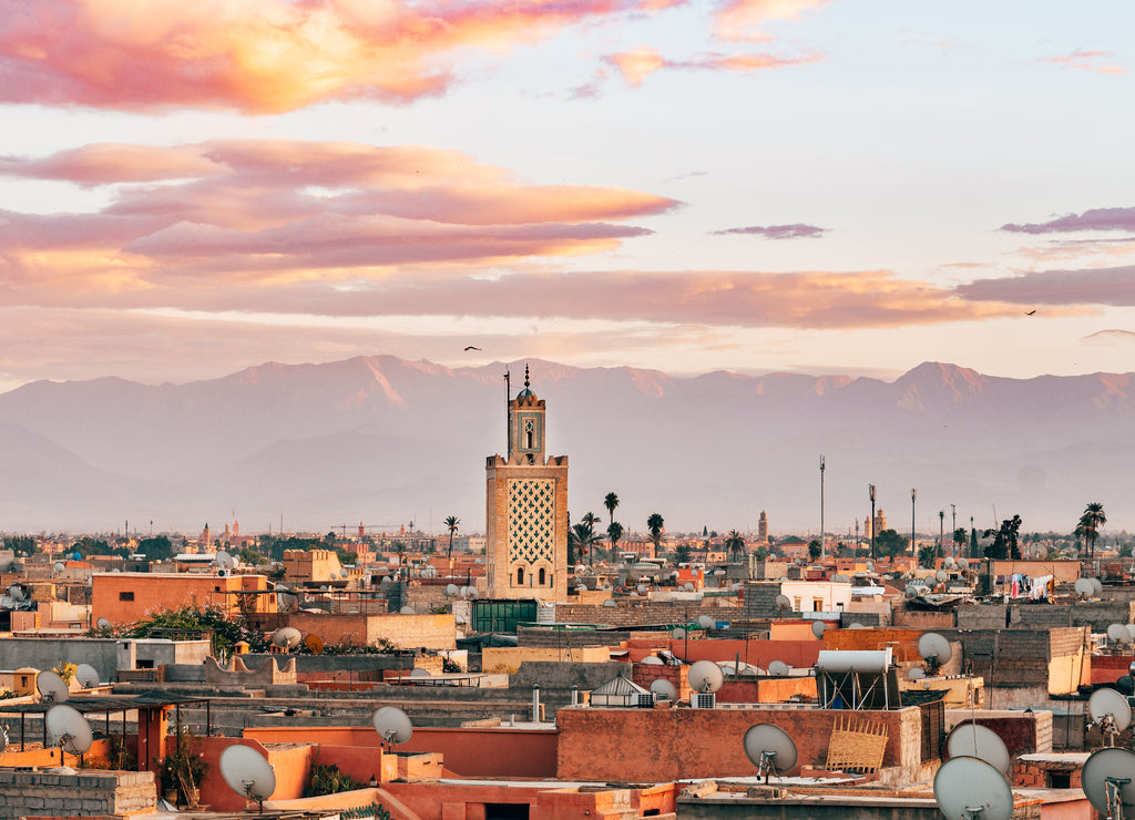 Panoramic views of Marrakech medina with Atlas mountain range at background, Morocco