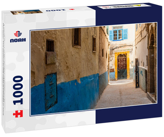 A small street in the medina of Essaouira in Morocco. The bottom of the walls is painted in blue