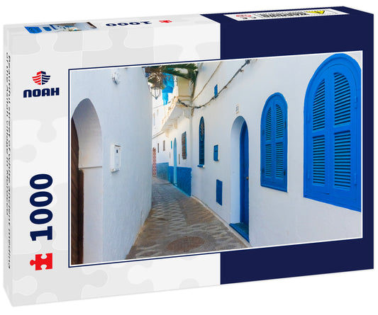 Beautiful street of white ancient medina of the Asilah village in Morocco