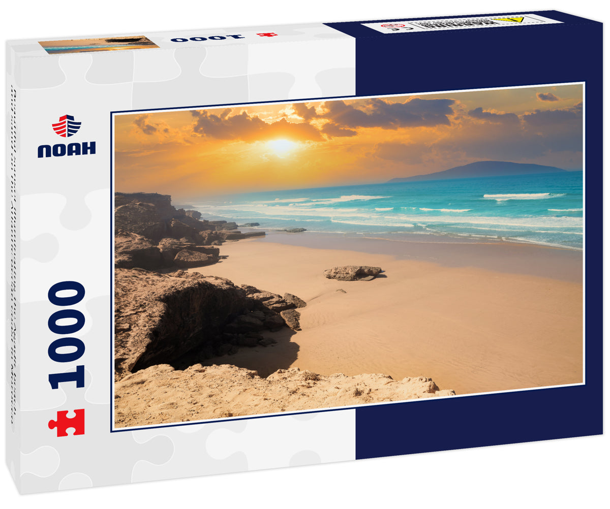 Beautiful sunset illuminating the Agadir beach and sand on the Atlantic ocean coast in Morocco