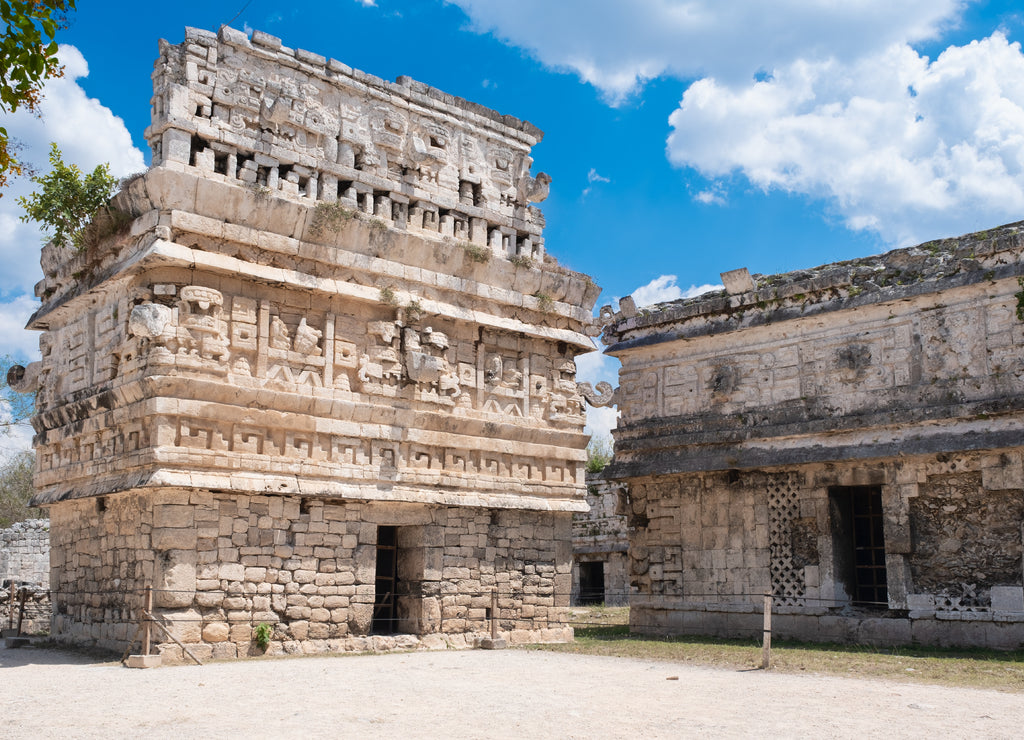 Temple with elaborate carvings at the ancient mayan city of Chichen Itza in Mexico