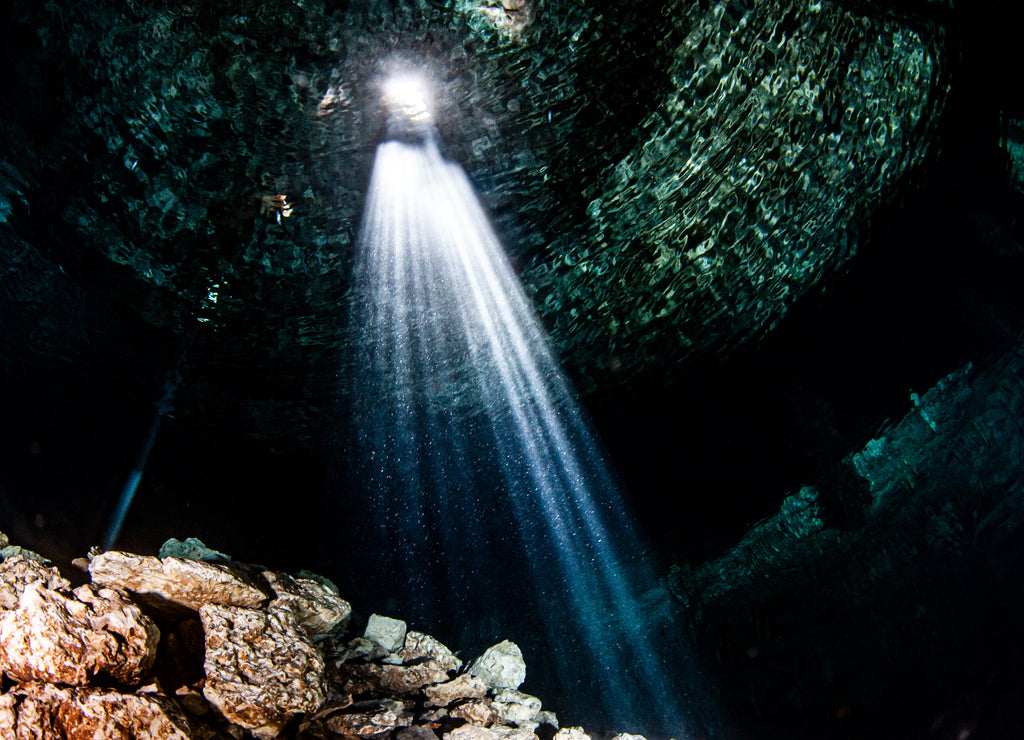 Scuba diving in the Cenote Tajma Ha in Mexico