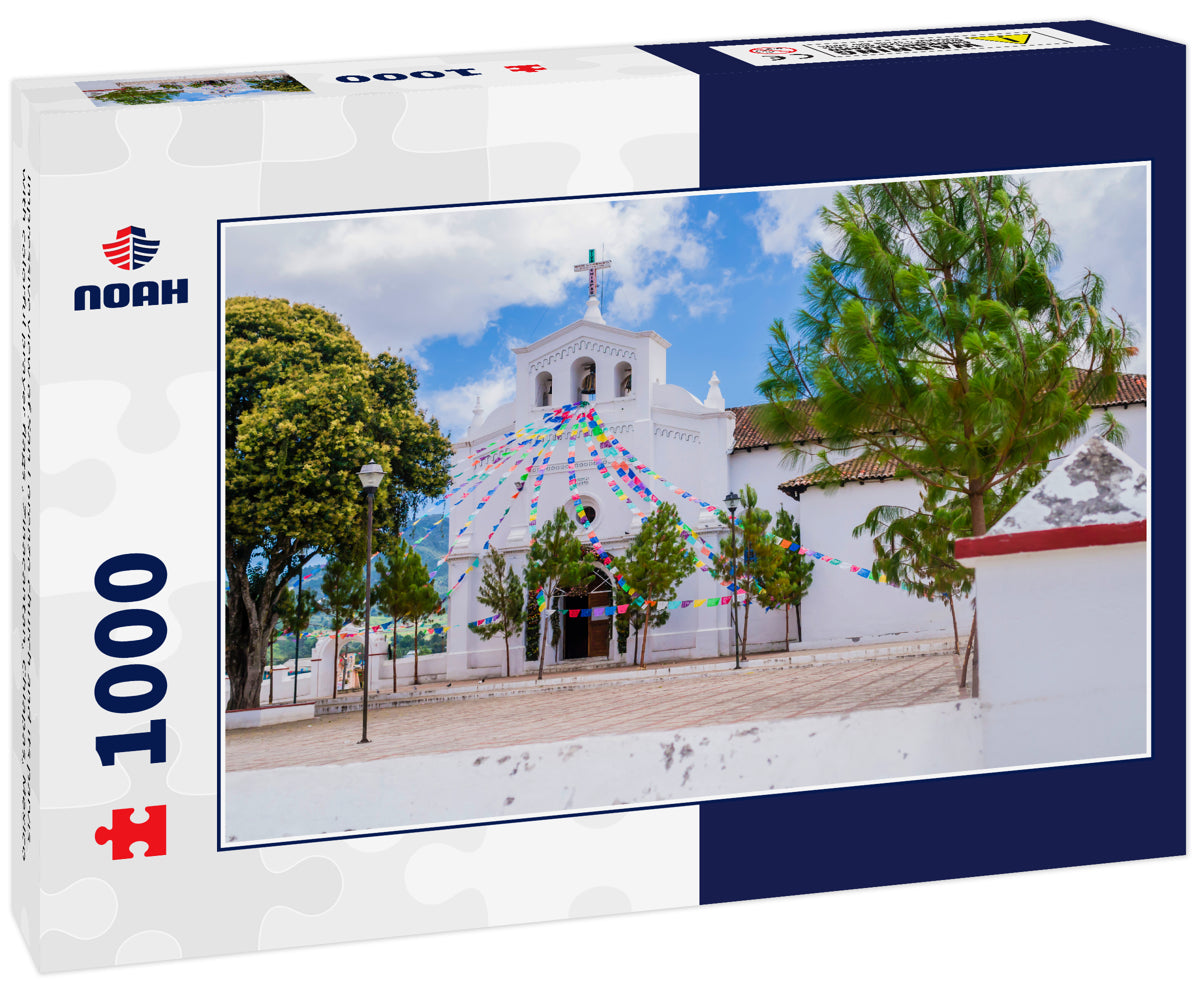 Impressive view of San Lorenzo church and its parvis with colorful prayer flags , Zinacantan, Chiapas, Mexico