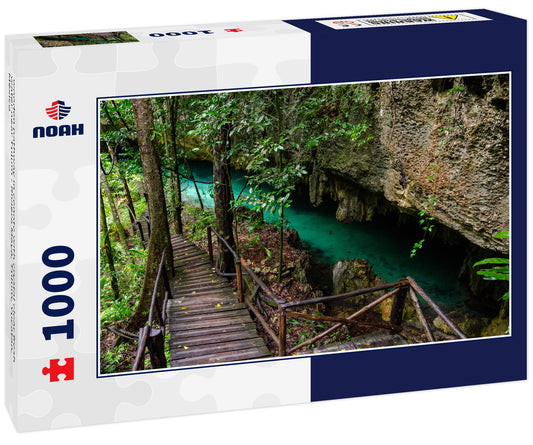 wooden pathway in cenote with crystal clear fresh water near Tulum - Riviera Maya, Tulum, Yucatan, Mexico