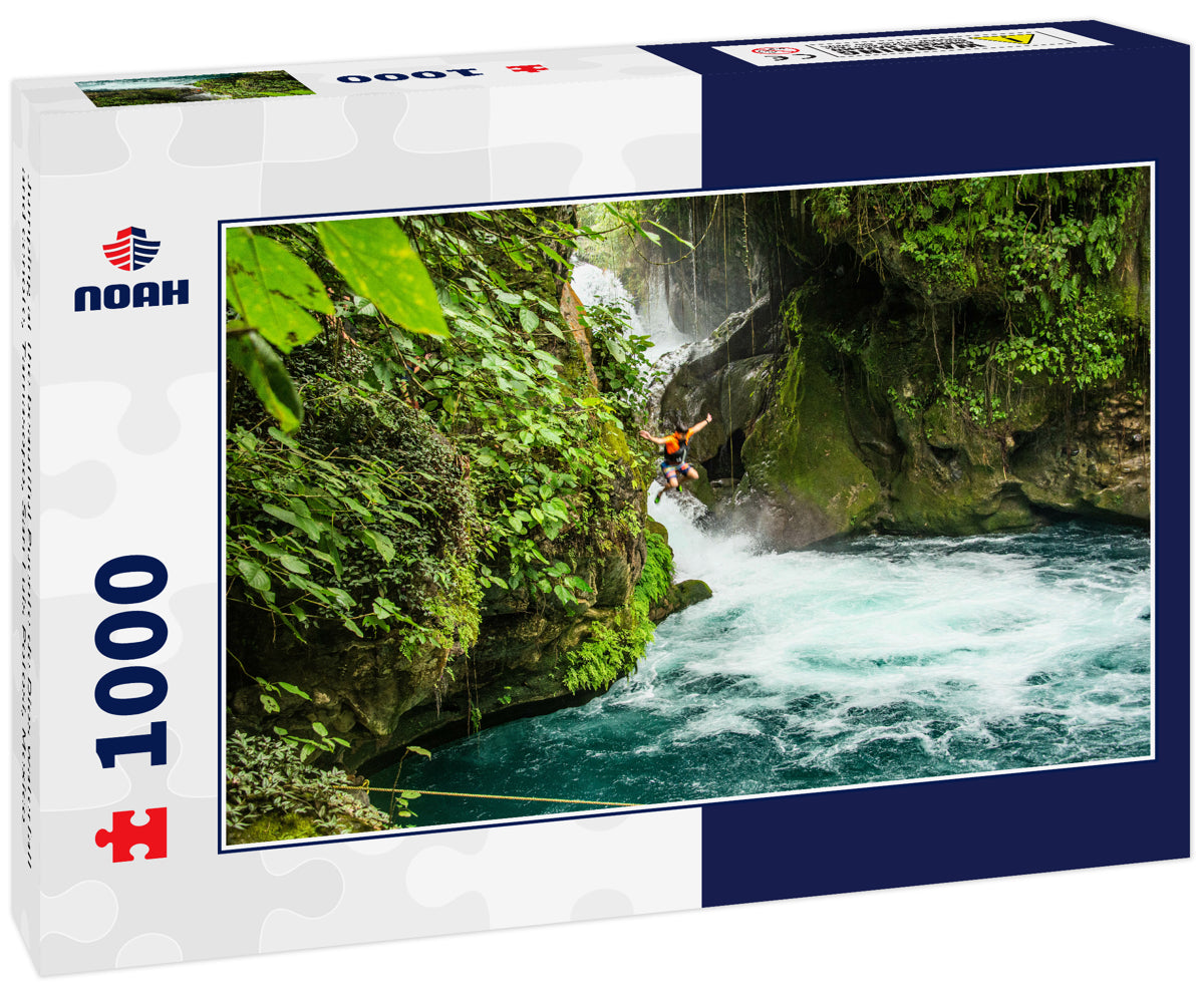 Jumping at the beautiful Puente de Dios waterfall and cenote, Tamasopo, San Luis Potosi, Mexico