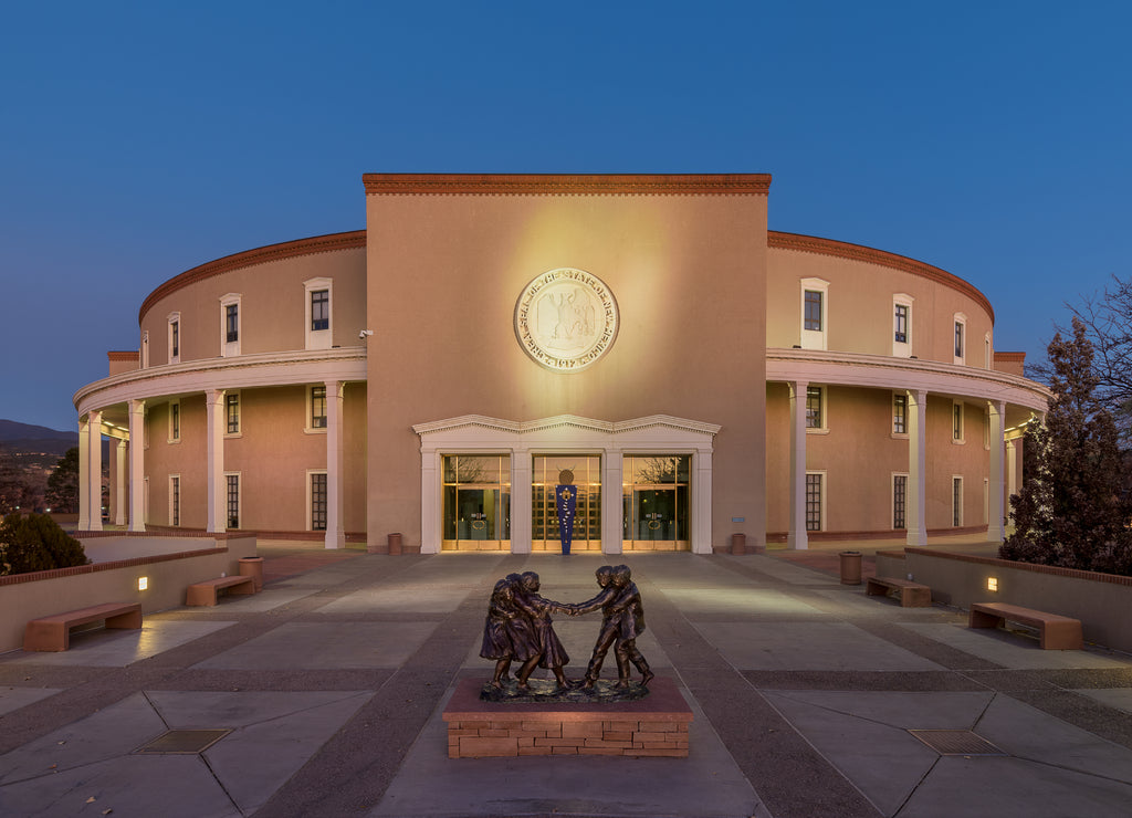 Exterior of the New Mexico State Capitol at night in Santa Fe, New Mexico