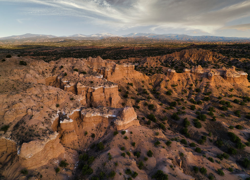 Sunset Aerial photograph of a New Mexico Landscape with Views of dramatic cliffs, mountains, and mesas