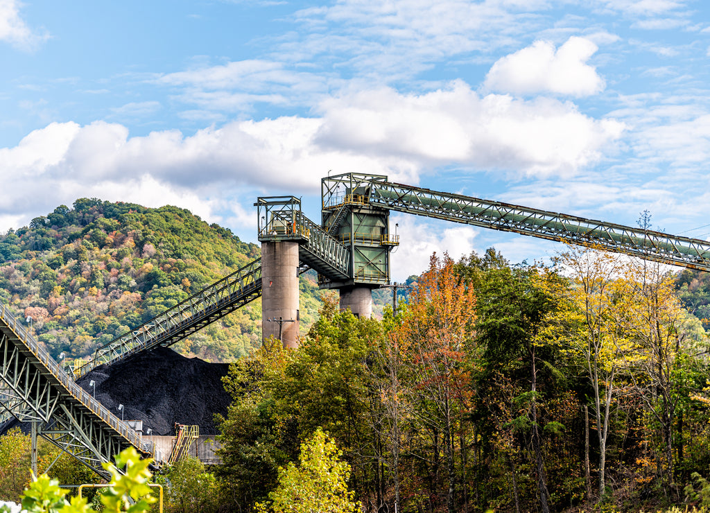 Charleston, West Virginia, USA city with industrial factory coal conveyor belt power plant exterior architecture with elevator lift