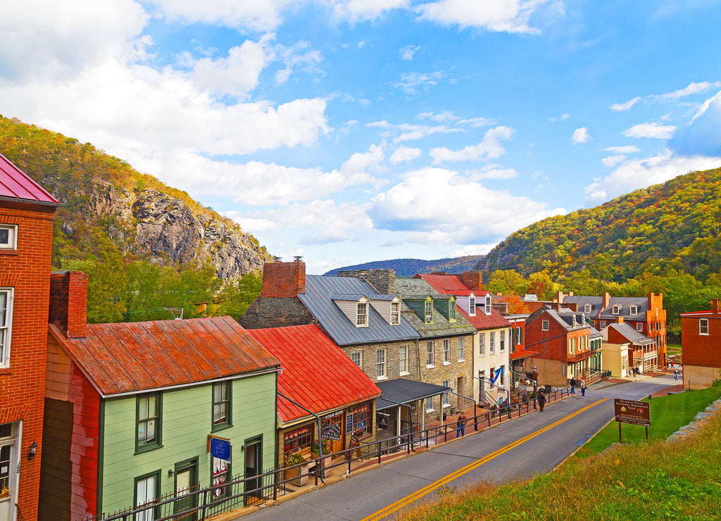 Harpers Ferry historic town in autumn and Blue Ridge Mountains. Houses on the street of historic town in Harpers Ferry National Historical Park, West Virginia, USA