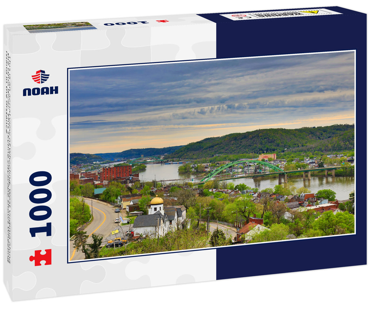 This is an aerial view of Wheeling, West Virginia along the Ohio River. This skyline cityscape shows Wheeling Island in the distance