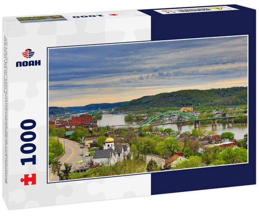 This is an aerial view of Wheeling, West Virginia along the Ohio River. This skyline cityscape shows Wheeling Island in the distance