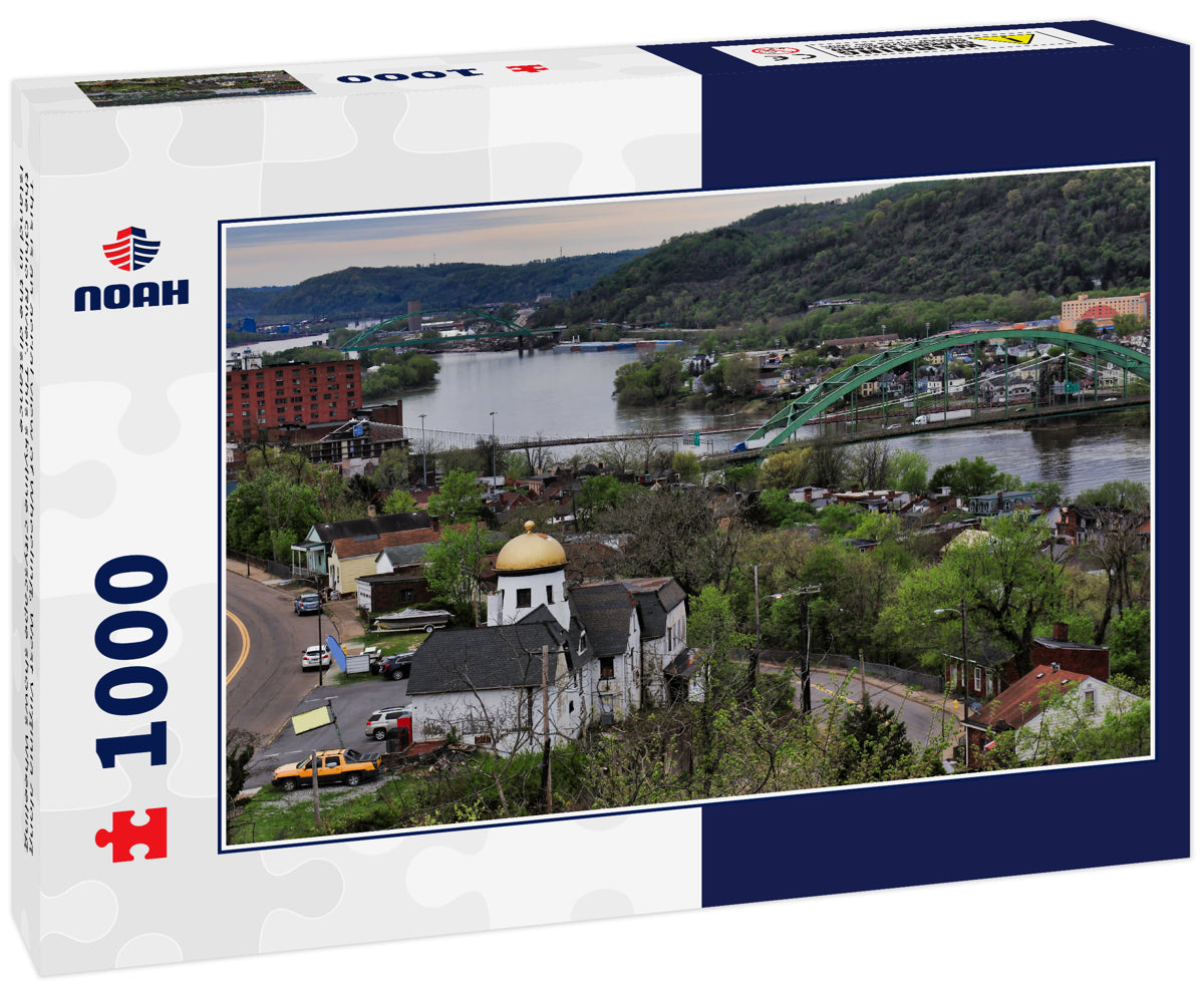 This is an aerial view of Wheeling, West Virginia along the Ohio River. This skyline cityscape shows Wheeling Island in the distance