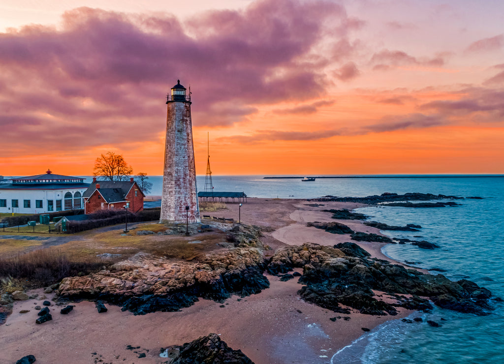 Lighthouse and Oyster Boat at Sunrise on New Haven Harbor, Connecticut