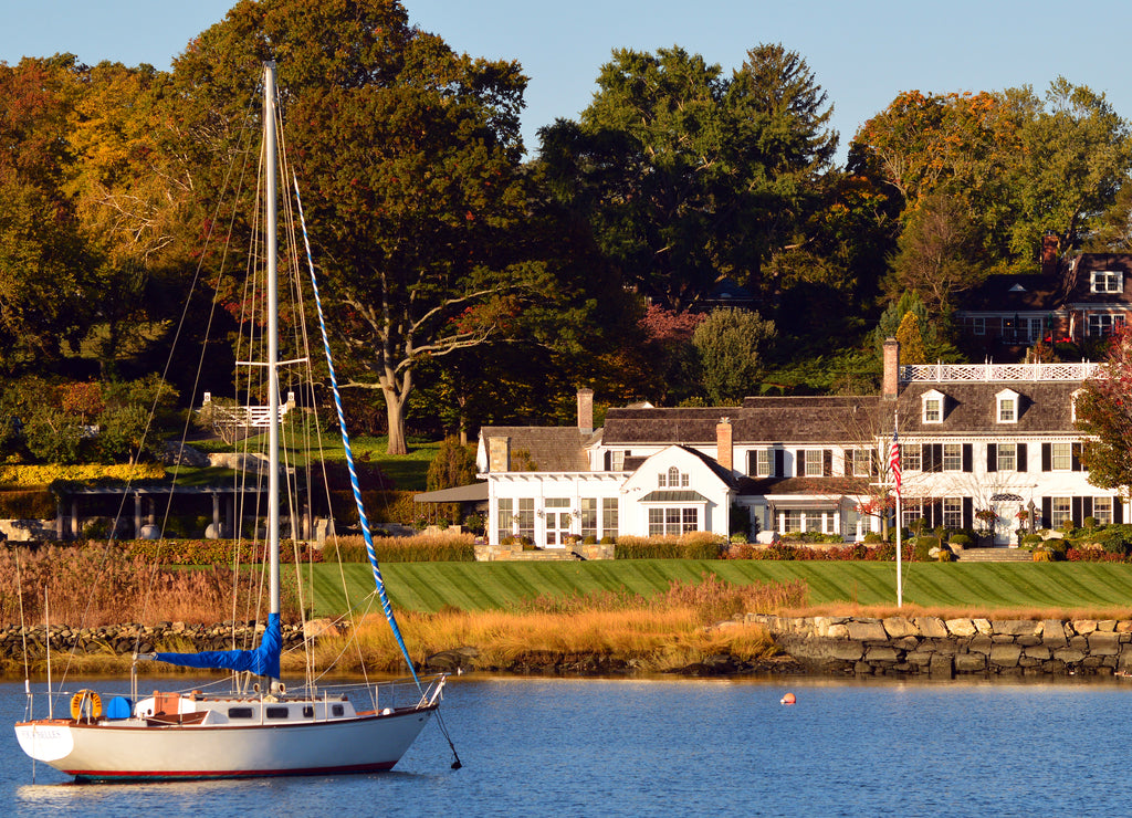 A rich life: A sailboat is moored at a luxury waterfront homes in Greenwich Connecticut, often considered one of the wealthiest towns in America