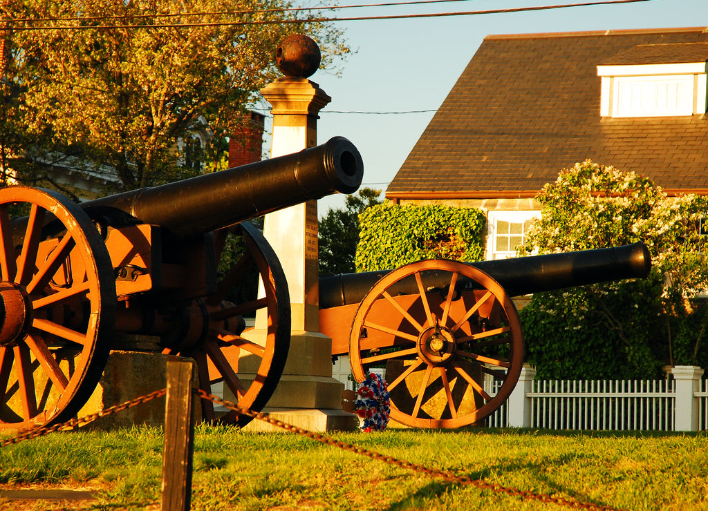 Cannons stand on a town green in Stonington, Connecticut