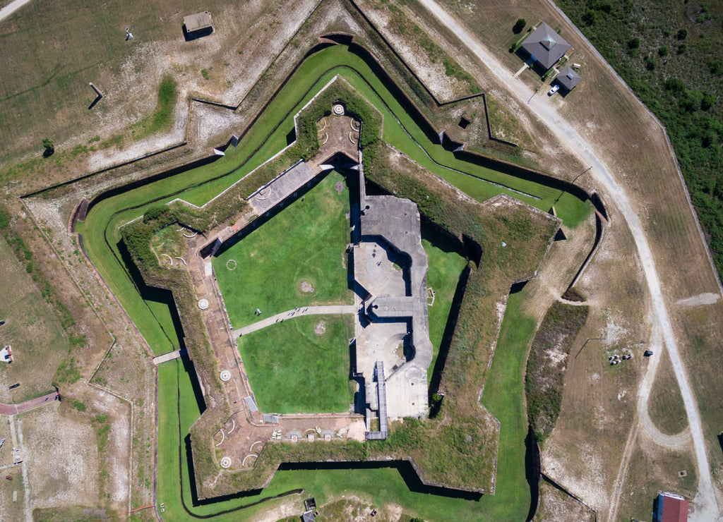 Drone/Aerial photograph of Fort Morgan. A Civil War fort located at the end of the Gulf Shores peninsula, the entrance to Mobile Bay. Alabama, USA