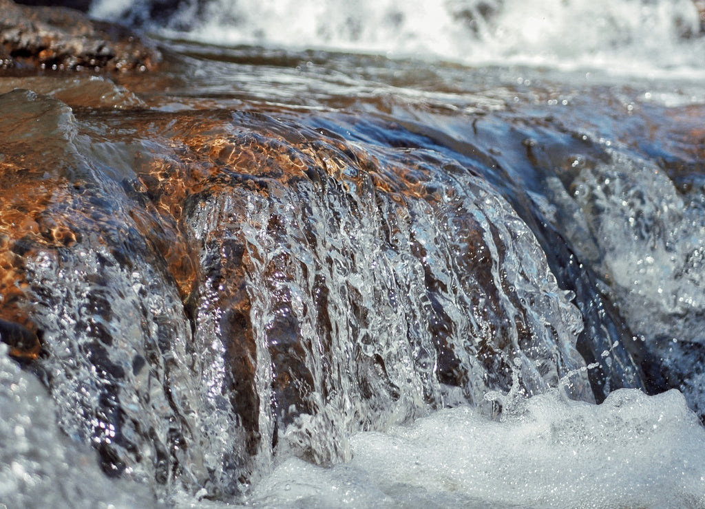 Gentle water fall at a state park in Alabama with a bokeh background